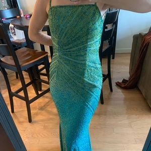 Teal beaded evening gown